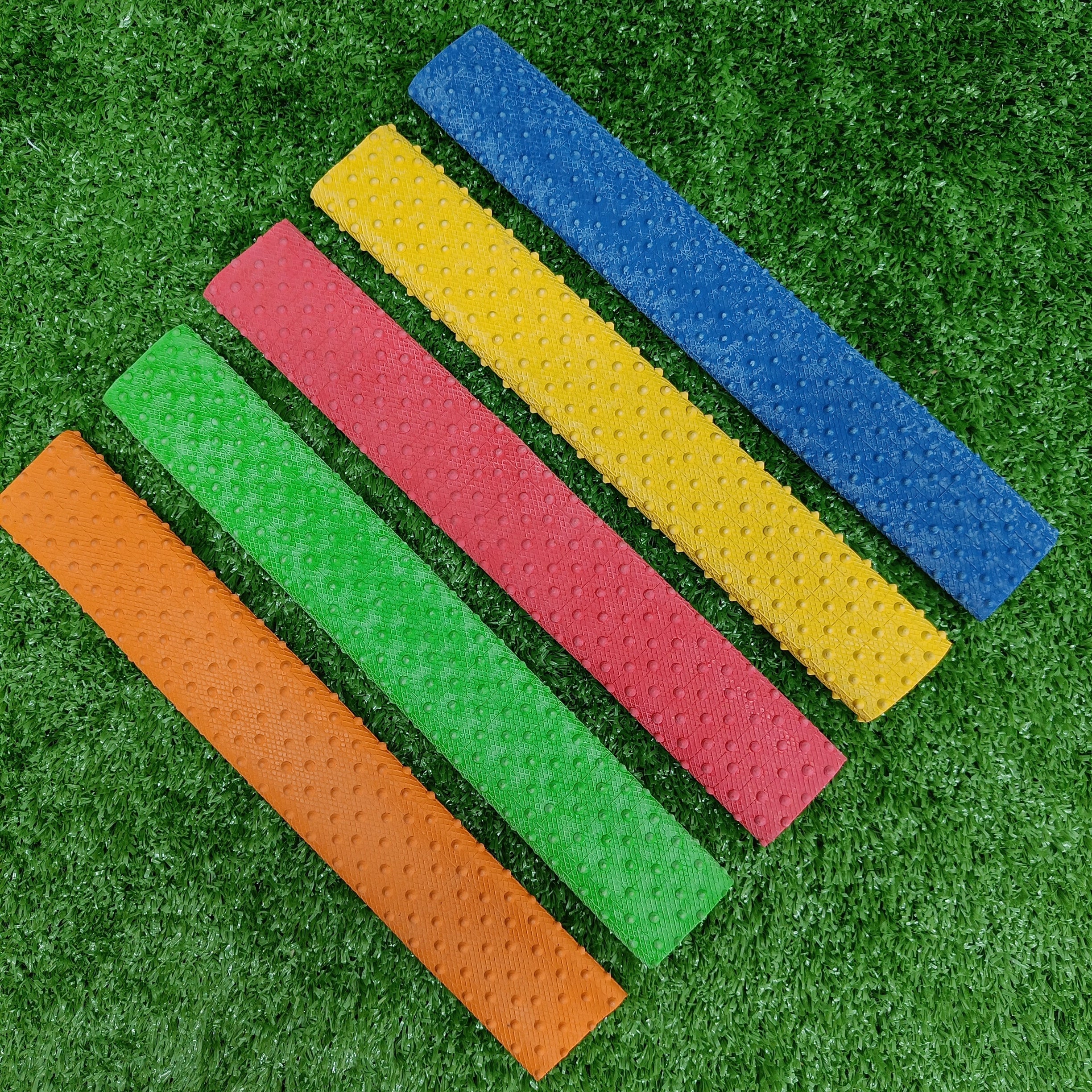 Raydn Dotted Multi Colored Cricket Grip by Raydn - in-use view - TopCricketStore