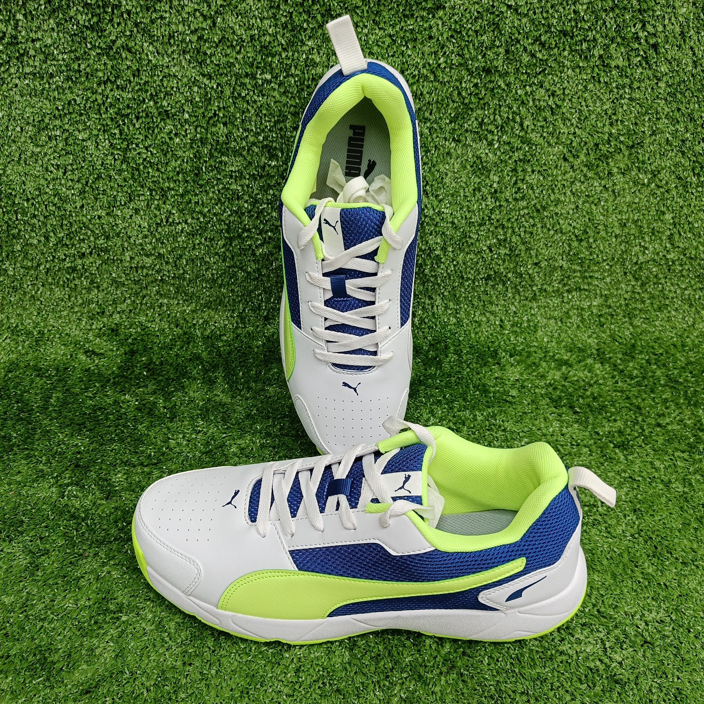 Puma White Blazing Blue Fast Yellow Cricket Shoes by Puma - close-up detail - TopCricketStore