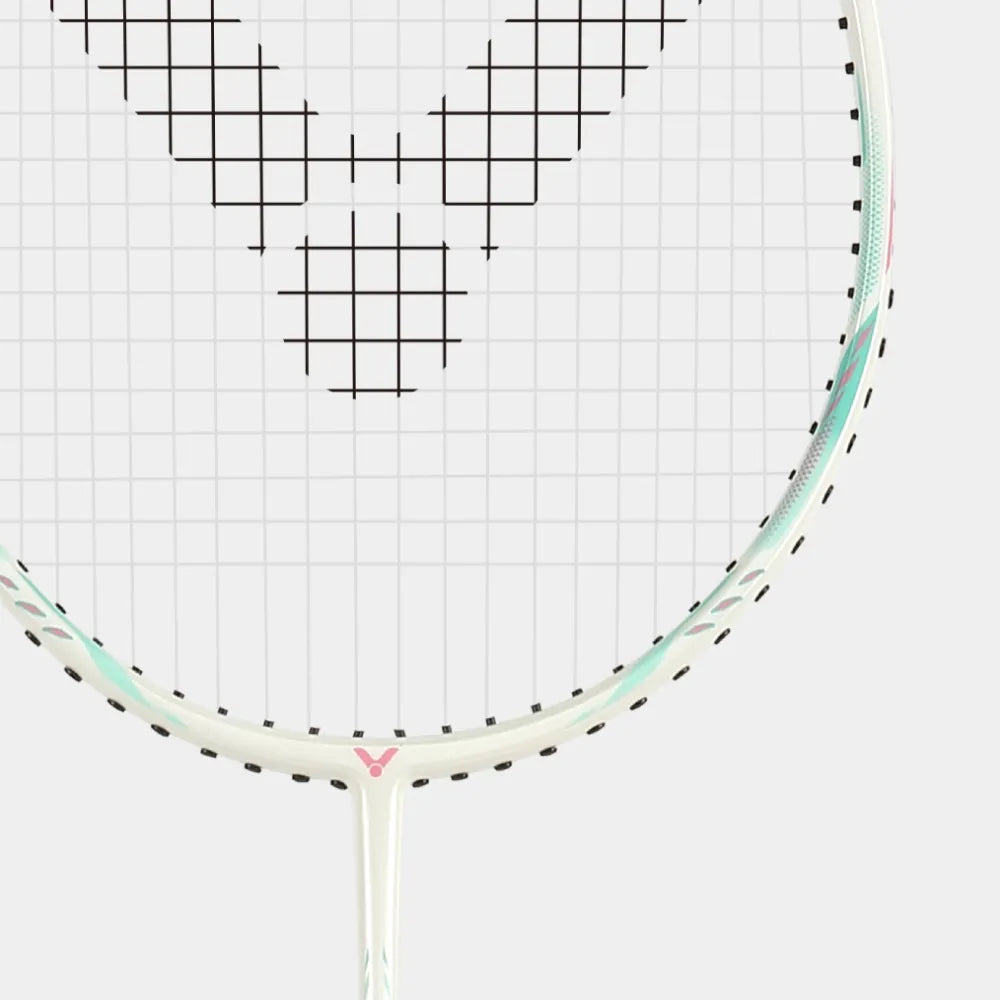 Close up of the T-joint on the Victor Thruster Ryuga Sport I in pink and mint green.