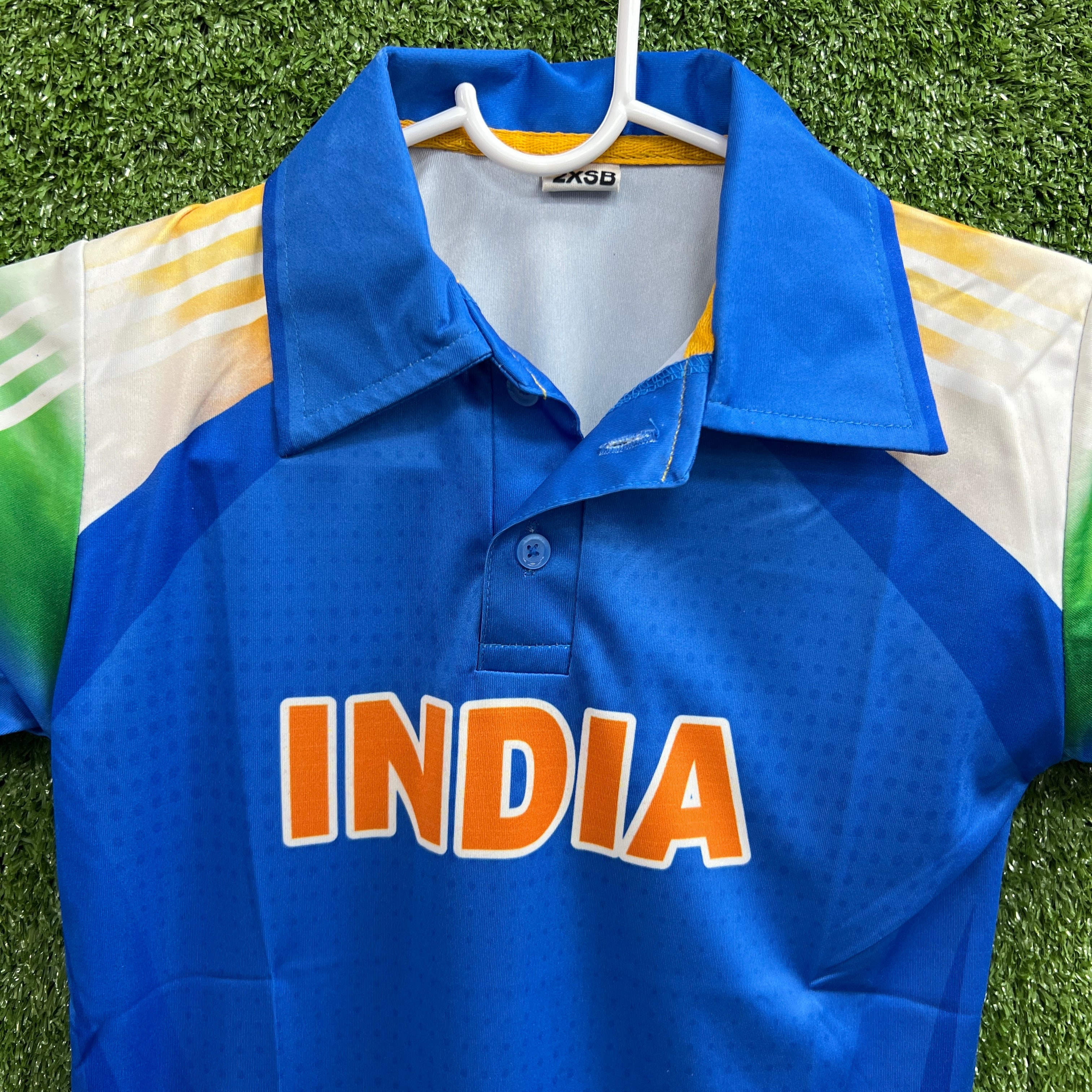 Shows the plain back of the jersey, illustrating the space available for adding a custom name and number.