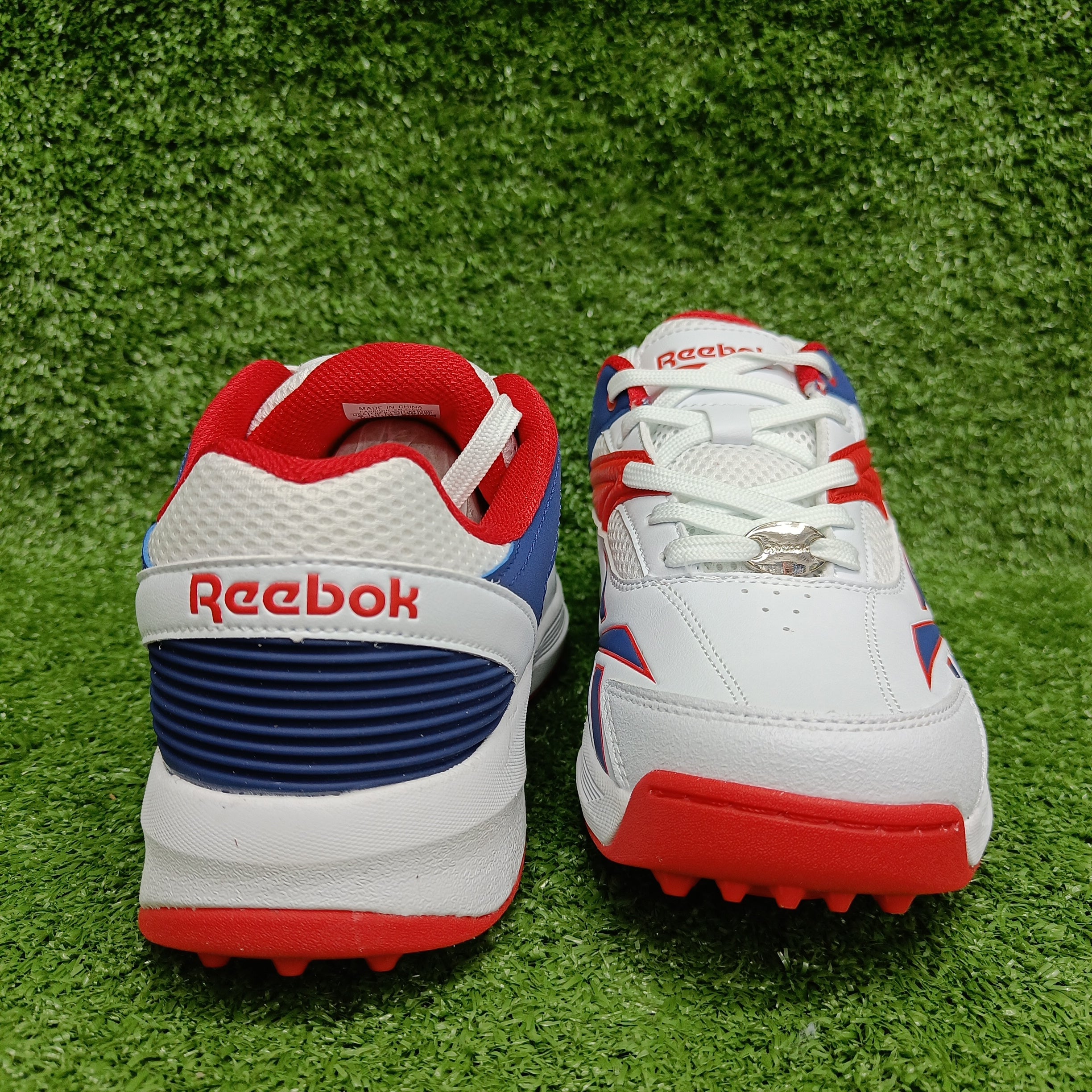 Reebok Not Out Syndicate White Vector Blue Red Cricket Metal Spike Shoes-3-Top_Cricket_Stoe
