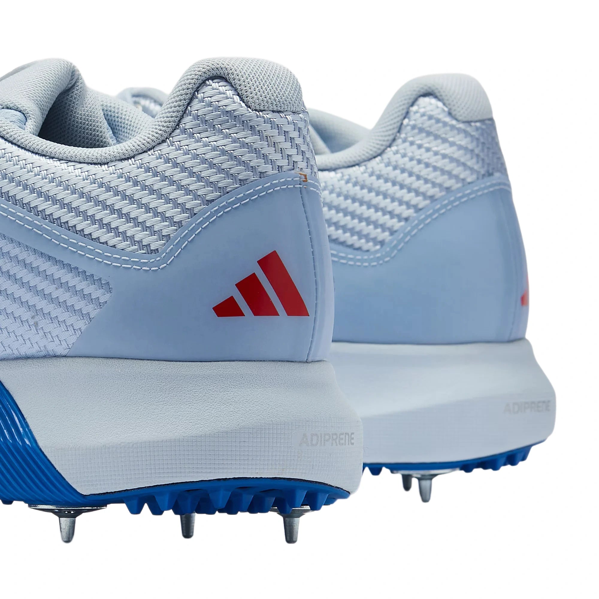 Close-up rear view of Adidas Adipower Incurza cricket shoe heel counter and three heel spikes