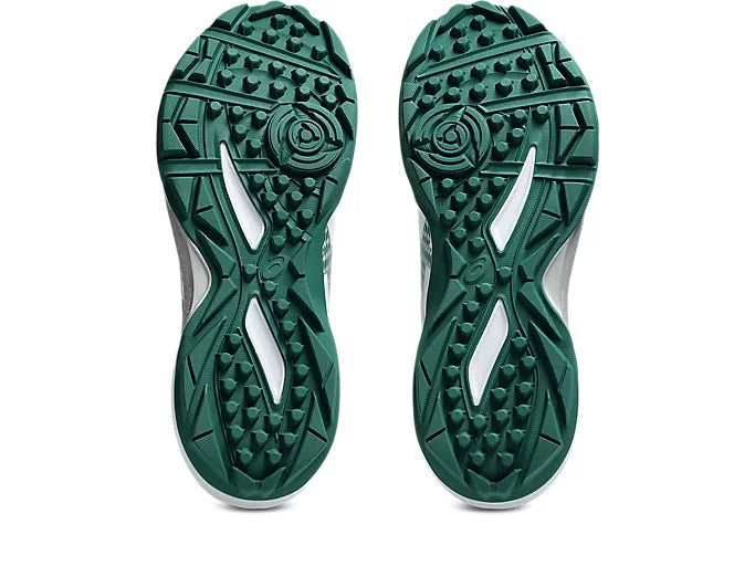 Close up of the redesigned rubber dimple outsole designed for artificial cricket pitches.