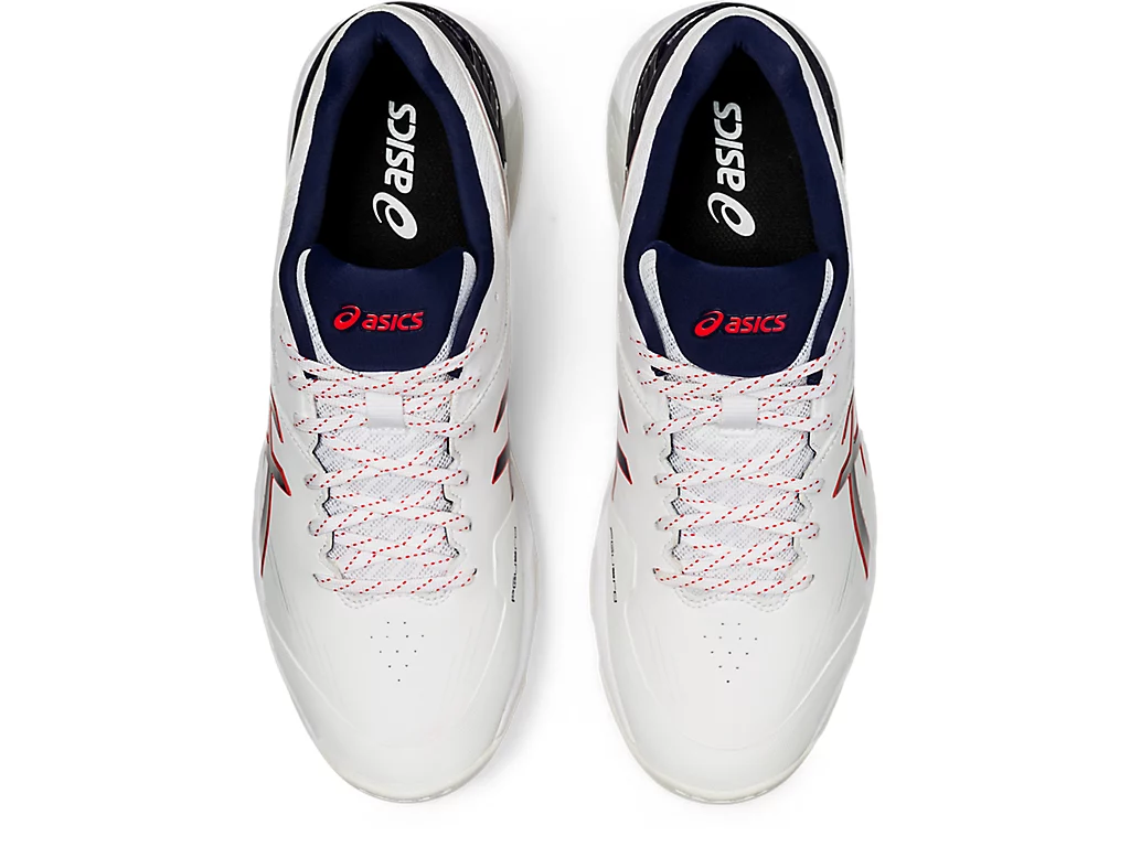 Asics 350 Not Out FF (White/Peacot) Cricket Metal Spike Shoes by Asics - in-use view - TopCricketStore