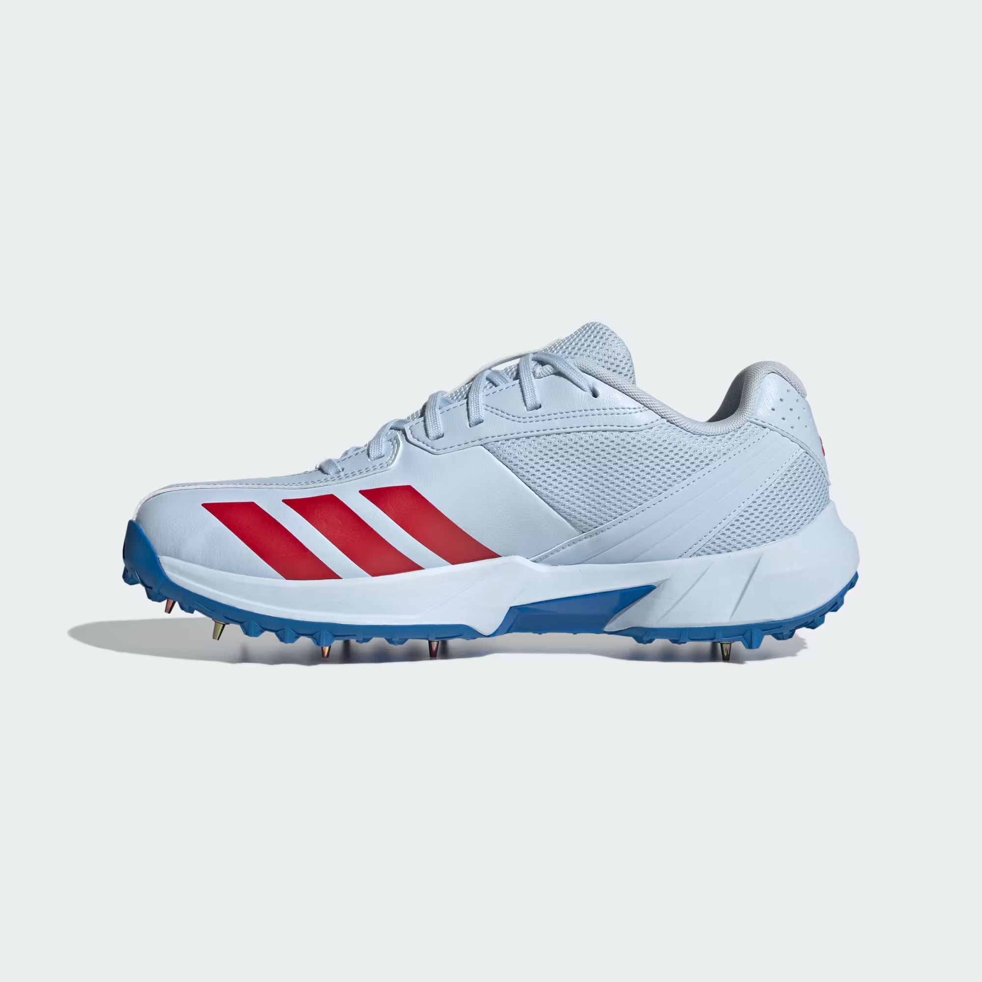 Angled front view of Adidas 22YDS metal spike shoes for cricketers