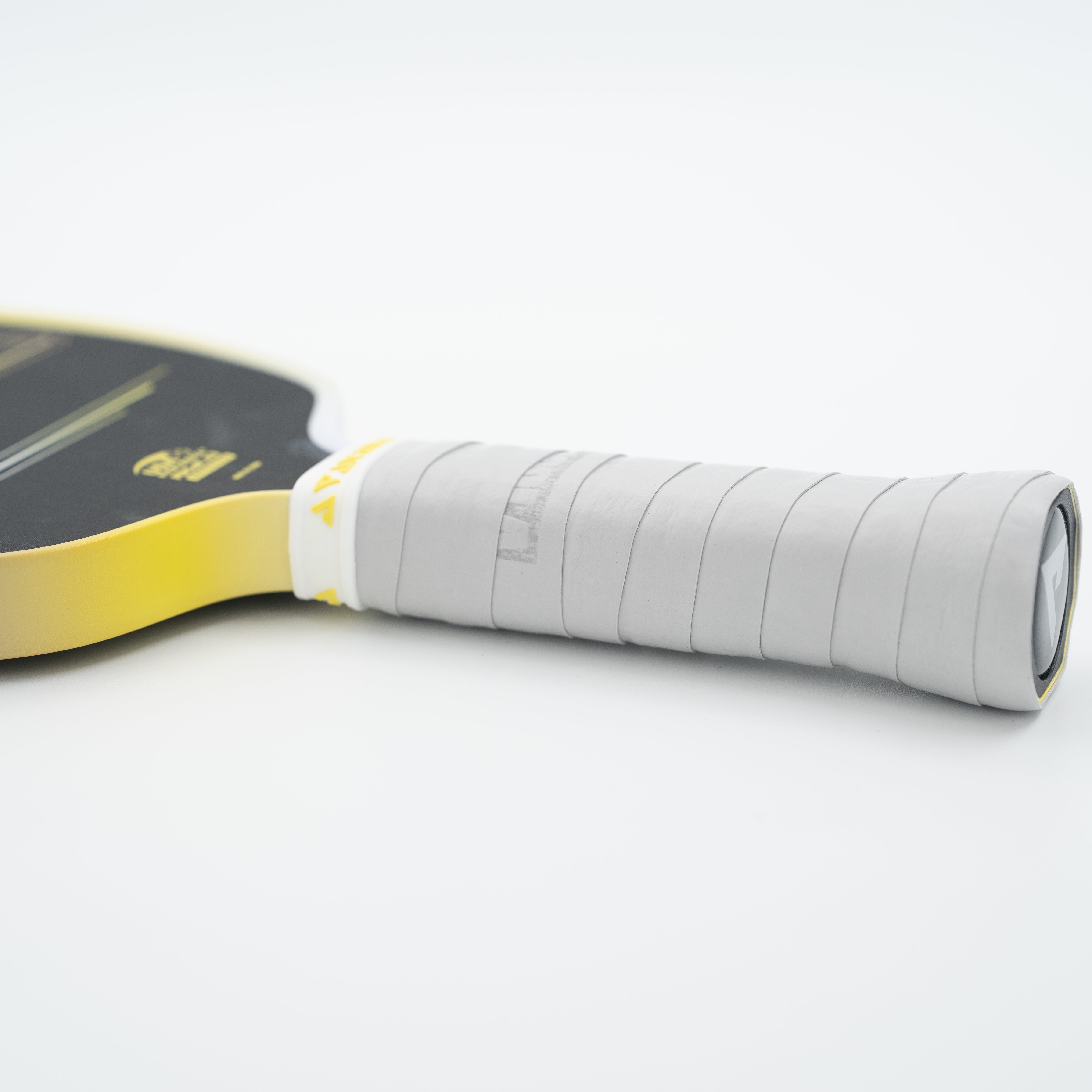 JOOLA Premium overgrip wrapped on a pickleball paddle handle