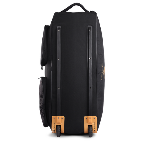 Close-up back view of SG X3 cricket wheelie bag showing bartack-reinforced stress points and grip handle construction