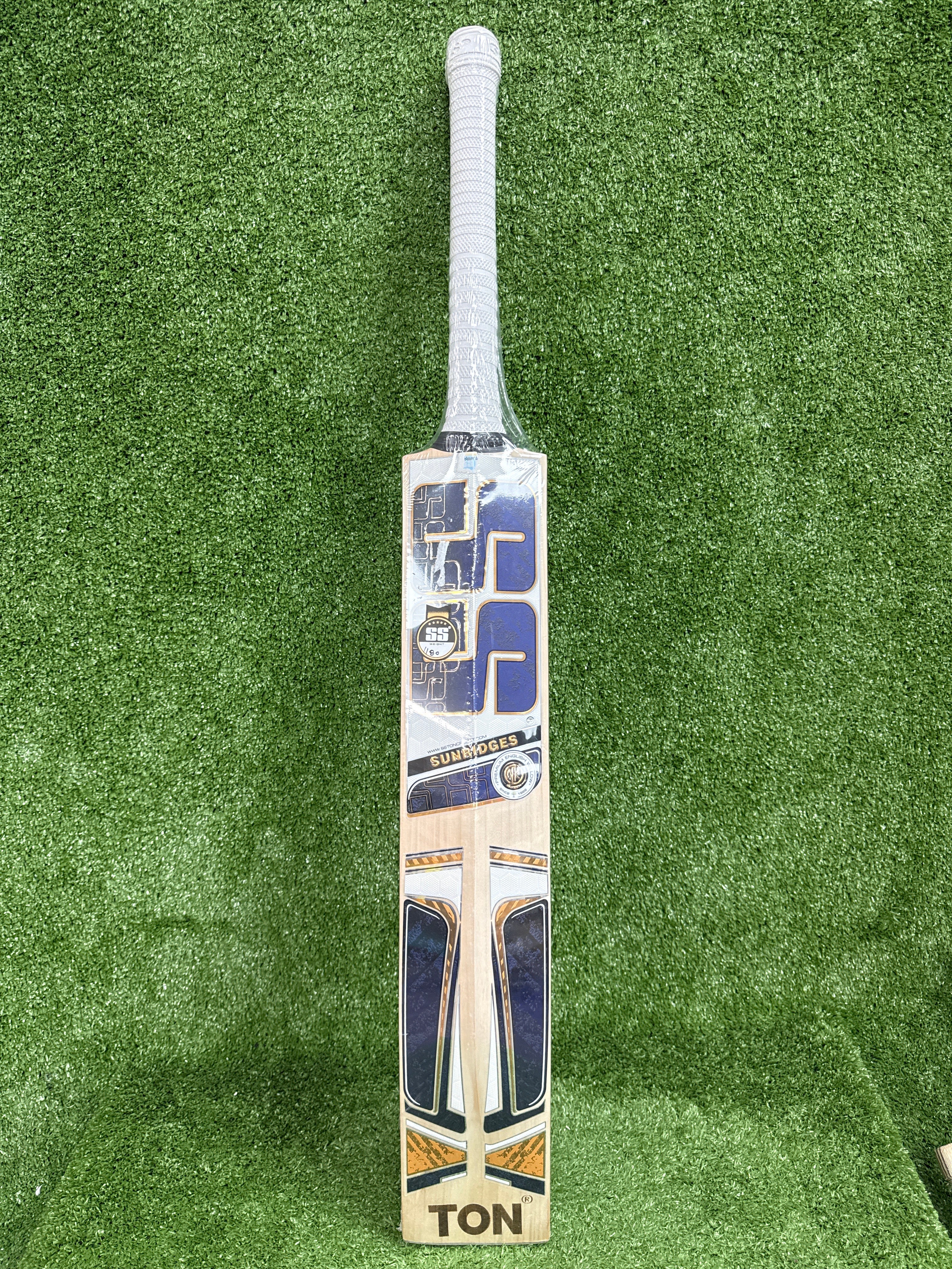 Back of SS Master 99 bat featuring embossed chrome stickers and full spine profile