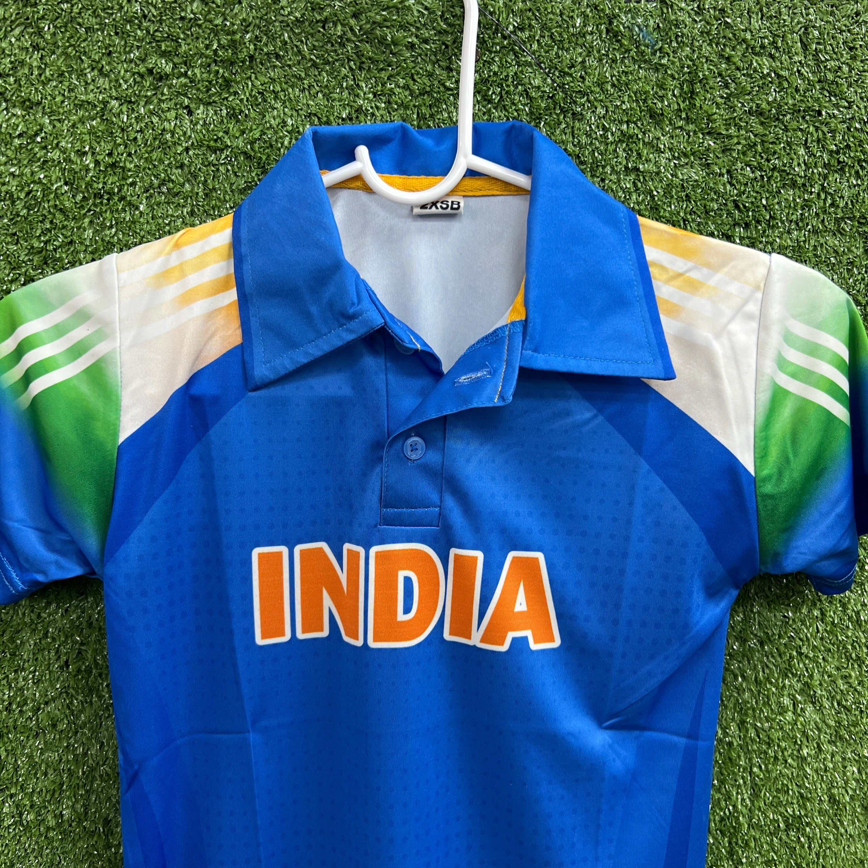 Focuses on the center chest area, highlighting the vibrant blue fabric quality and the bold orange "INDIA" lettering.