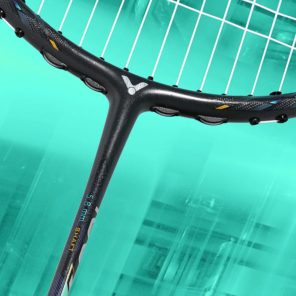 Close-up of Victor Auraspeed 100X Ultra racket head with green and black frame