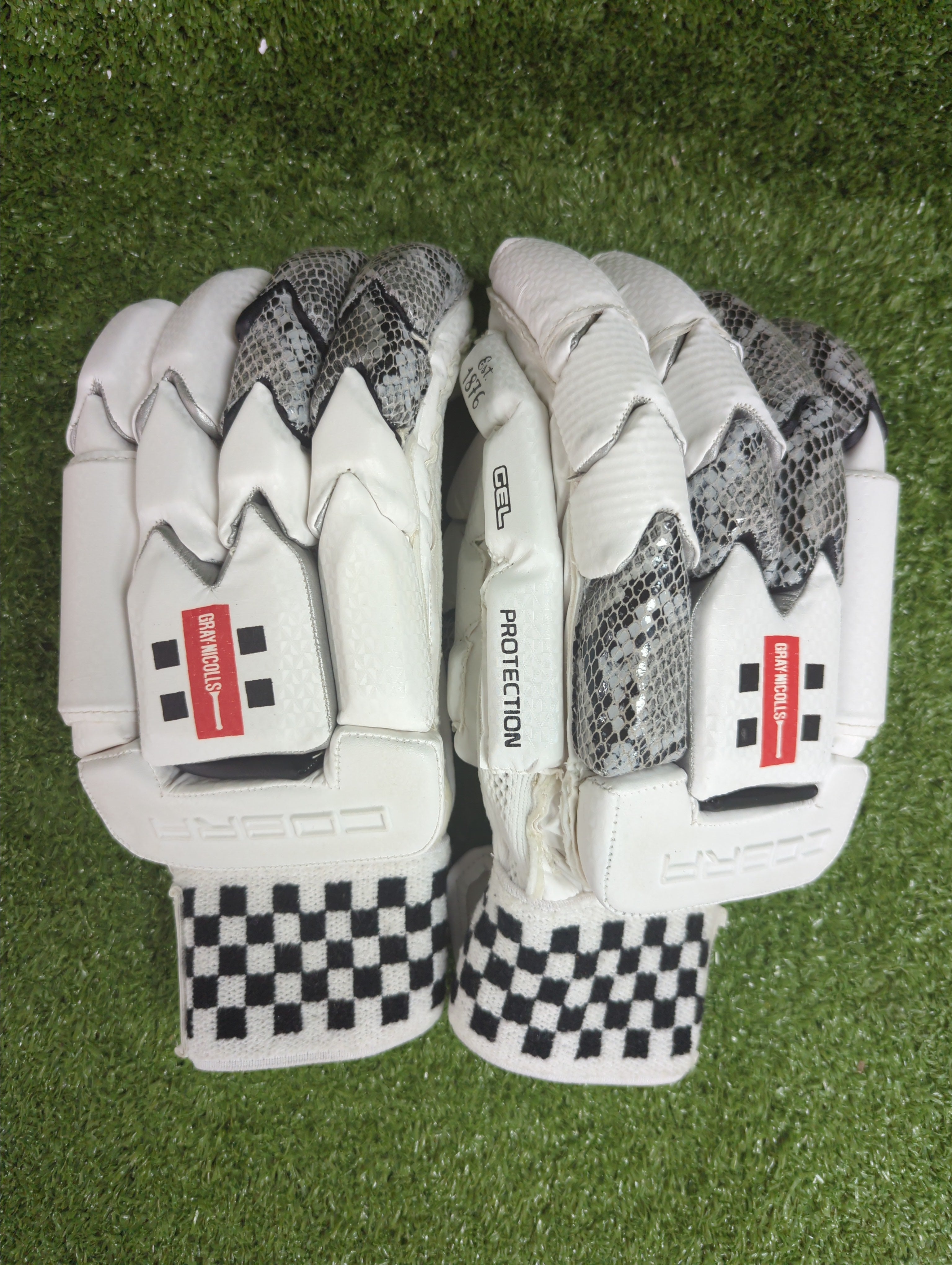 Front view of Gray-Nicolls Cobra Adult Cricket Batting Gloves showing red diamond design