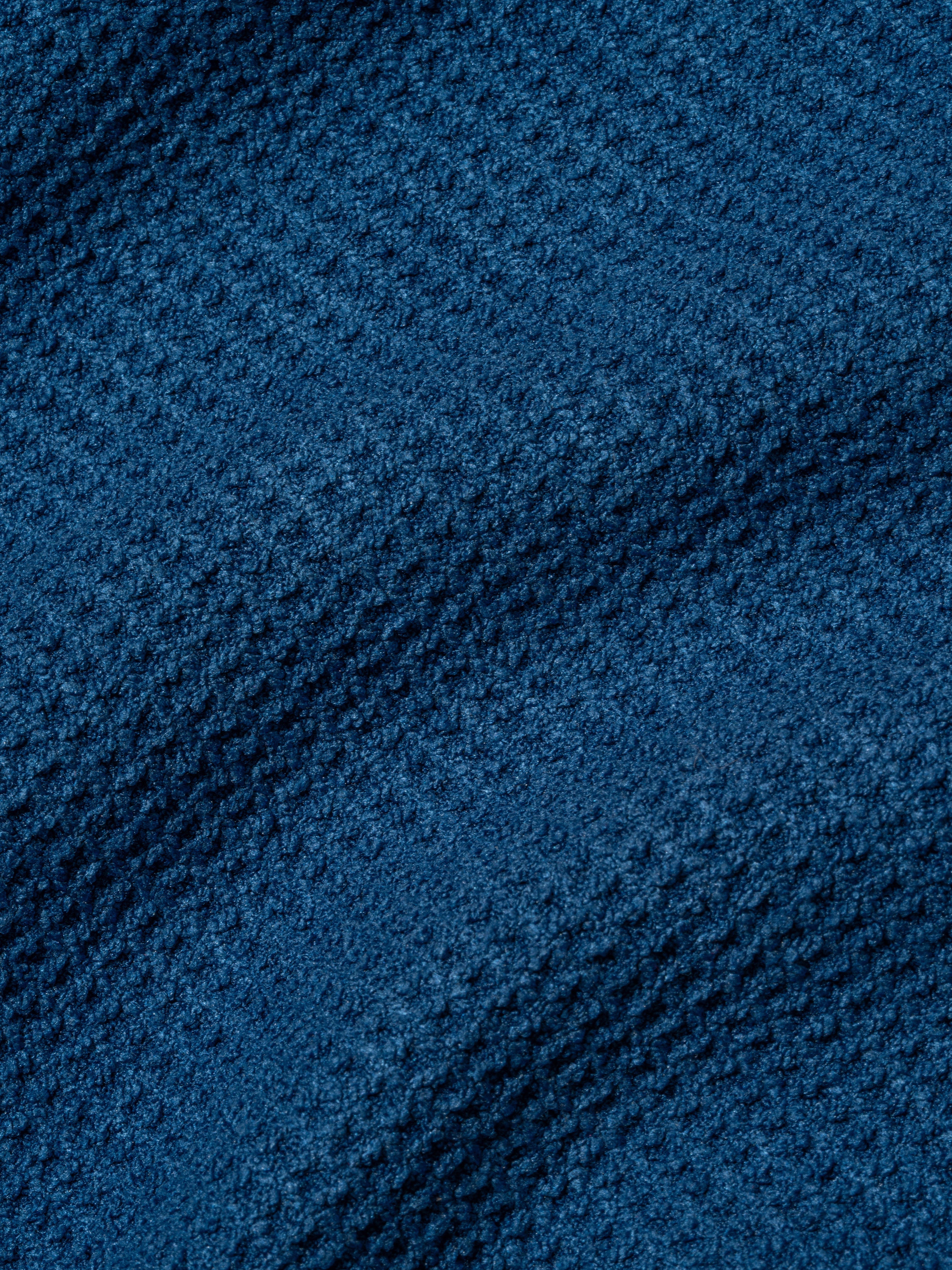 Close up of the quick-drying waffle weave fabric texture on the Selkirk Players' Pickleball Towel