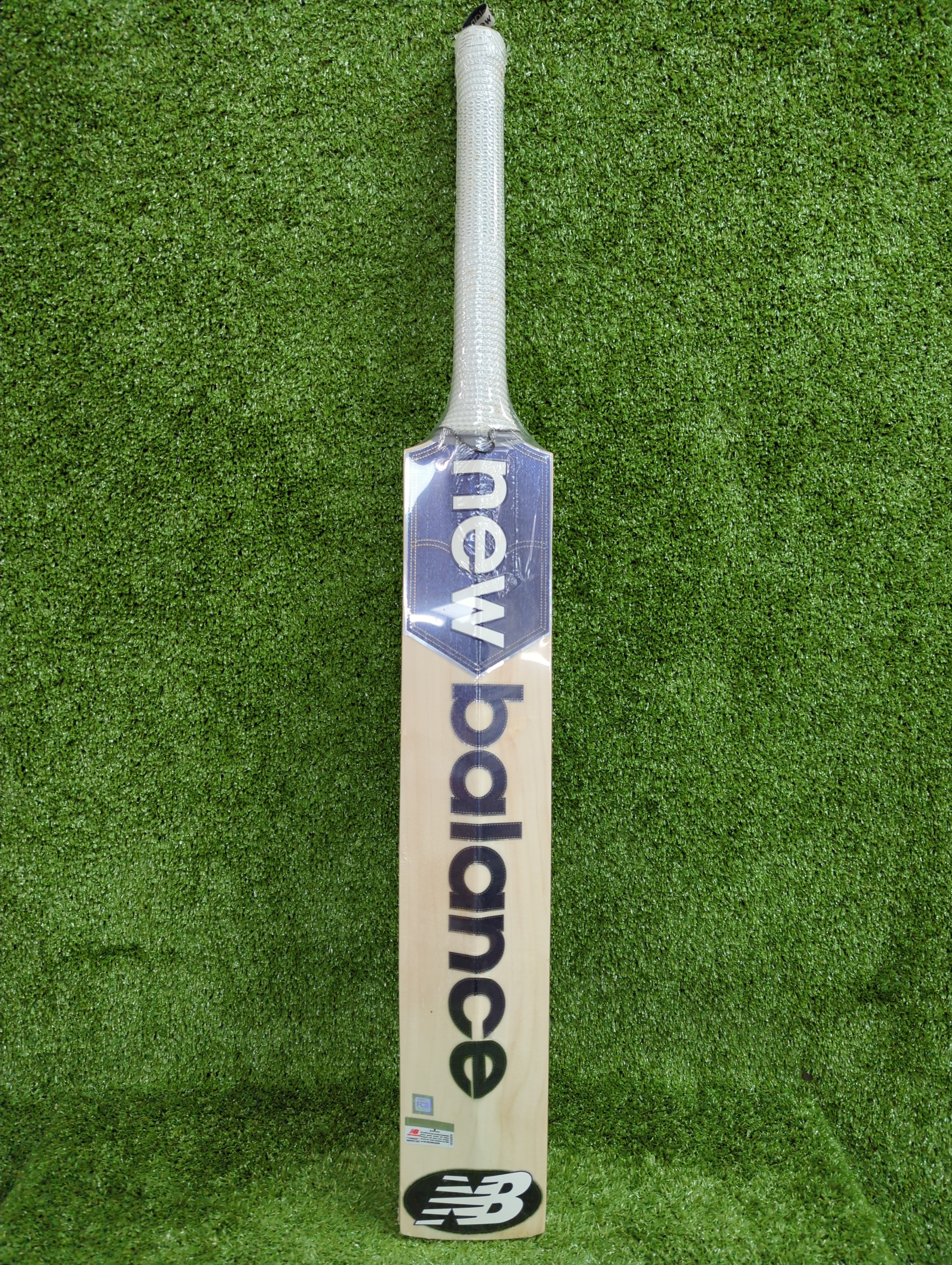NB DC 600i English Willow Cricket Bat by NB - packaging view - TopCricketStore