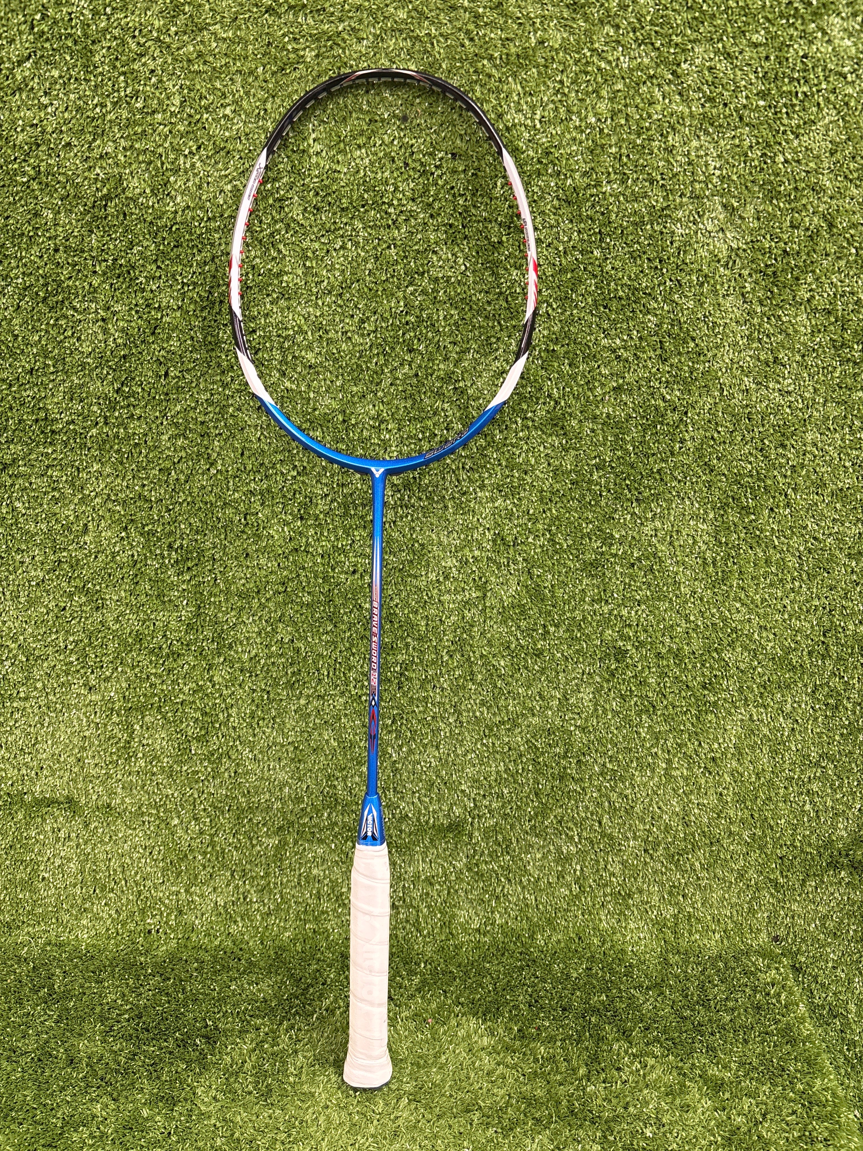 Shaft detail of the Victor Brave Sword 12 Pro (BRS-12) badminton racket, highlighting the sleek design and Midnight Blue paintwork.