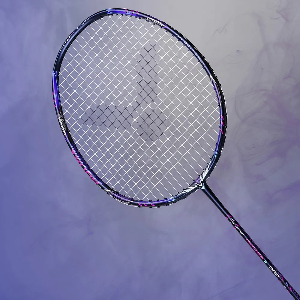 Full view of the Victor Thruster TK-Ryuga II Pro B badminton racket in Mazarine Blue, showing the unstrung head-heavy profile designed for aggressive attackers.