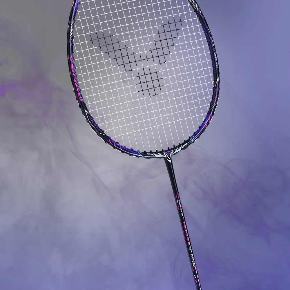 Side profile angle of the Victor Thruster Ryuga II Pro B racket head, showcasing the WES 2.0 carbon layering designed for sharper downward smashes.