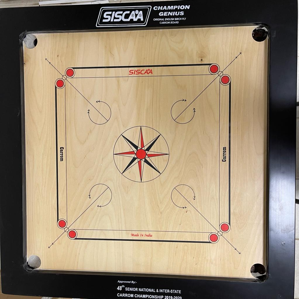 Siscaa Champion Genius 16mm English Birch Ply Carrom Board top view showing 30x30 inch playing surface, red pocket discs, and Siscaa branding